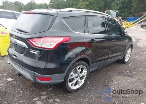 2016 Ford Escape Titanium z USA, uszkodzony, nr VIN 1FMCU0J92GUA42652